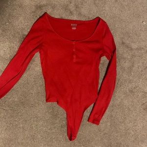 Red ribbed long sleeve bodysuit size medium
